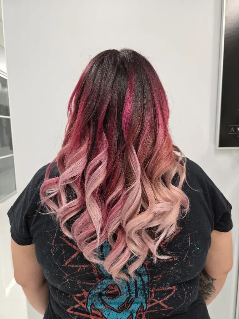 Creative pink hair color by Heather Wahl